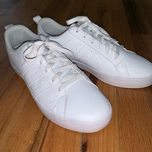 All white adidas original sneakers